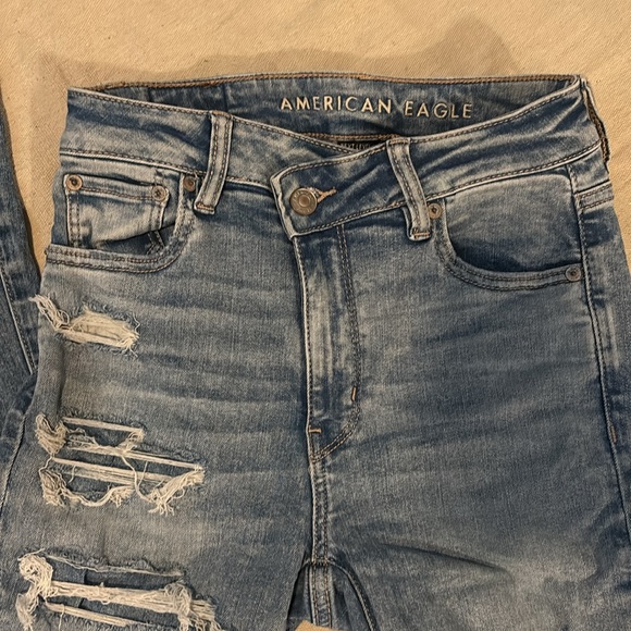 American Eagle Outfitters Women's Distressed Blue Flare Jeans - Picture 4 of 4